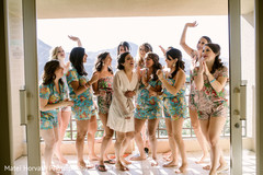 Indian bride and bridesmaids having fun before wedding ceremony Indian bride and bridesmaids having fun before wedding ceremony