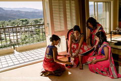 Indian bride trying her shoes before wedding ceremony Indian bride trying her shoes before wedding ceremony