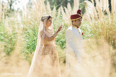 Indian couple about to see each other for the first time before wedding ceremony Indian couple about to see each other for the first time before wedding ceremony