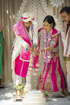 Lightning the sacred fire. indian wedding ceremony,indian bride,indian groom,indian wedding photography