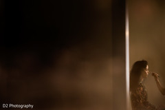 Indian bride getting ready for wedding ceremony