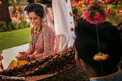 Indian bride about to see the groom at wedding ceremony