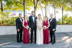 Bride and groom with their wedding party Bride and groom with their wedding party
