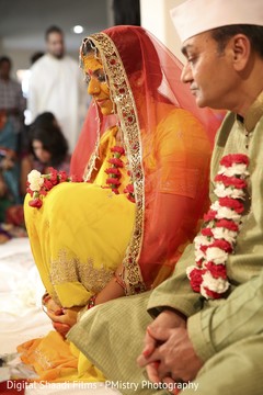 Bride praying during Haldi Bride praying during Haldi