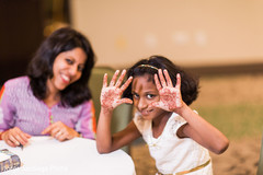 Indian kid showing her mehndi art mehndi,henna,indian wedding photography