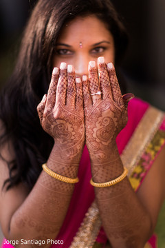 Beautiful indian bride showing her mehndi art and engagement ring bridal jewelry,indian bridal mehndi,indian bridal makeup