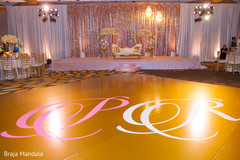 Stunning wedding dance floor and stage. indian wedding reception,floral and decor,stage,dance floor,lightning