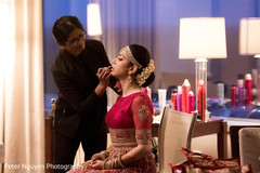 Lovely bride getting her makeup done Lovely bride getting her makeup done