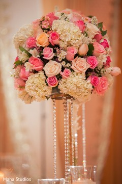 Floral centerpieces at indian wedding reception Floral centerpieces at indian wedding reception