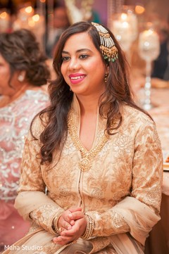 Indian lady having a good time at wedding reception Indian lady having a good time at wedding reception