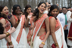 Indian bridesmaids having fun before wedding ceremony Indian bridesmaids having fun before wedding ceremony