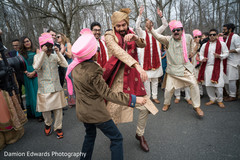 Indian groom dancing at baraat procession Indian groom dancing at baraat procession