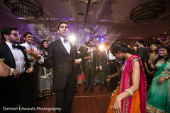 Everybody waiting for the DJ to play something at wedding reception indian wedding gallery,lightning,indian groom suit