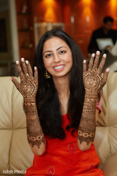 Indian bride showing her mehndi art Indian bride showing her mehndi art
