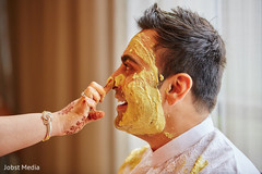 Indian groom photography at haldi ceremony henna,pre-wedding celebrations,haldi