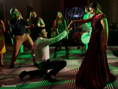 Lovely indian bride and groom at wedding reception party