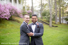 Gay Indian couple in matching wedding suits. Gay Indian couple in matching wedding suits.