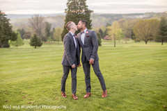 Sunset gay couple multi-cultural wedding photo shoot. Sunset gay couple multi-cultural wedding photo shoot.