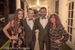 Indian newlyweds posing with their wedding guests. Indian newlyweds posing with their wedding guests.
