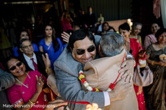 Indian parents hugging indian wedding photography,indian wedding guests
