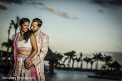 indian couple posing during beach side photo shoot indian couple posing during beach side photo shoot