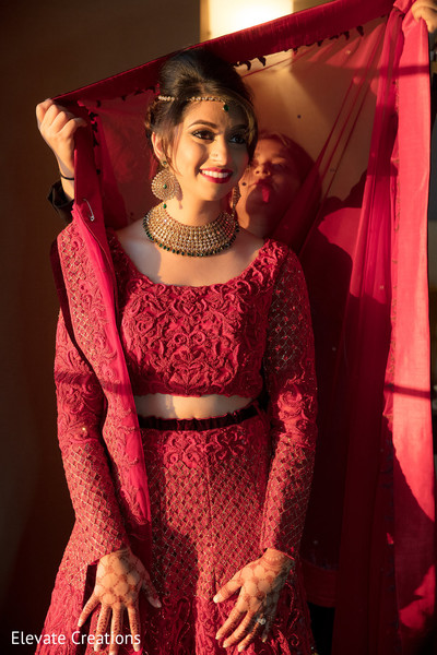 Candid shot of Indian bride getting ready.