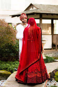 The most cutest first look moment. indian bridal fashion,indian bride,lengha,red lengha,indian groom