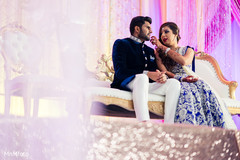 Lovely indian couple enjoying their wedding reception. indian wedding reception,indian bride,indian groom,indian reception fashion