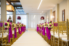 Floral bouquets on the ends of the ceremony rows. Floral bouquets on the ends of the ceremony rows.