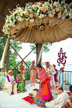 Indian bride and groom at wedding ceremony indian wedding ceremony photography,indian wedding ceremony,flower mandap