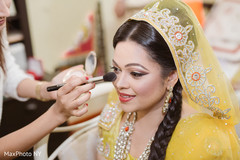 Charming indian bride getting makeup ready for wedding ceremony Charming indian bride getting makeup ready for wedding ceremony