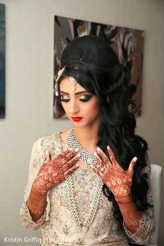 Glamorous Maharani wedding look. indian bride getting ready,indian bride hair and makeup,bridal mehndi