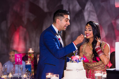 Cutest wedding reception moment. indian wedding reception,indian wedding cake,indian bride,indian groom