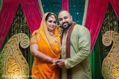 Indian bride and groom at mehndi party indian bride fashion,indian groom fashion,mehndi party,pre- wedding celebrations