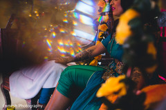 Indian bride getting mehndi art done Indian bride getting mehndi art done