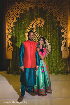 Lovely indian couple ready for sangeet sangeet,pre- wedding celebrations,indian bride and groom portrait