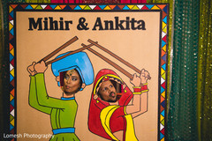 Indian bride and groom posing in photo booth sangeet,pre- wedding celebrations,sangeet decoration