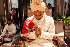 Indian groom praying. Indian groom praying.