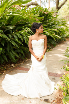 Dazzling indian bride in white wedding dress. Dazzling indian bride in white wedding dress.