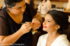 Indian beauty getting ready for her wedding day. indian bride hair and makeup,indian bride getting ready