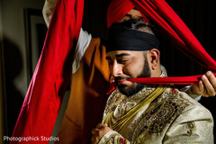 Sikh groom turban wrapping. Sikh groom turban wrapping.