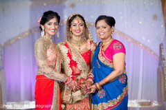 Indian bride with her mother and sister indian bride fashion,indian bride lengha,bridal jewelry,indian bridal makeup