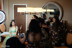 Indian bride getting ready for wedding reception Indian bride getting ready for wedding reception