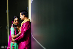 Indian bride and groom posing for photo shoot Indian bride and groom posing for photo shoot