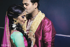 Indian groom kissing bride Indian groom kissing bride