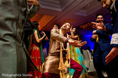 Candid shot of indian wedding celebration. indian wedding reception,dj,indian wedding photography