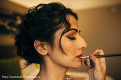 Lovely bride getting her makeup done Lovely bride getting her makeup done