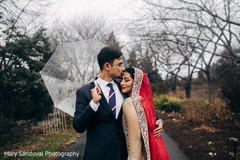 Indian groom kissing bride's forehead Indian groom kissing bride's forehead