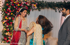 Indian bride being congratulated indian wedding ceremony,indian bride fashion,bridal jewelry