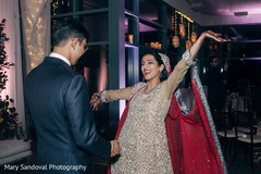 Indian bride and groom during wedding reception indian bride reception fashion,indian groom suit,indian wedding reception